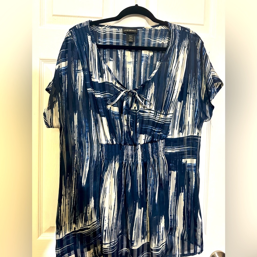 Lane Bryant plus size top with elasticized empire waist and tie at neck. 18/20